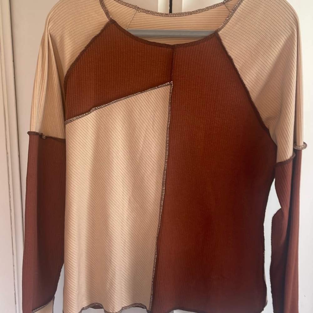 Adorable block top runs small